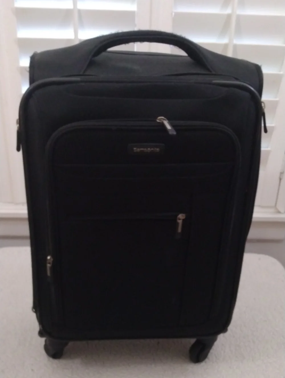 Samsonite Black Swivel Roller Carry On Suitcase